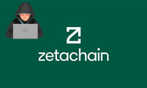 Hooded figure at a laptop on a dark green background beside the Zetachain logo.
