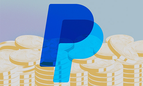 PayPal logo over gold coin stacks, symbolizing online payments and money.